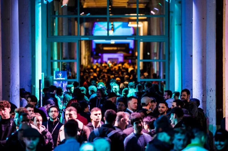 Solana Breakpoint 2026 Student Scholarship: Fully Funded Travel Opportunity 2 Attendees networking during Solana Breakpoint side events